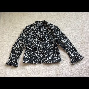 Woman’s Scott Taylor blazer.